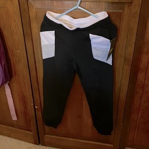 Black with gray and white front pockets